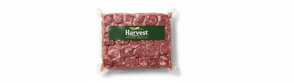 Vacuum-sealed beef stew meat with Harvest Prime Meats logo